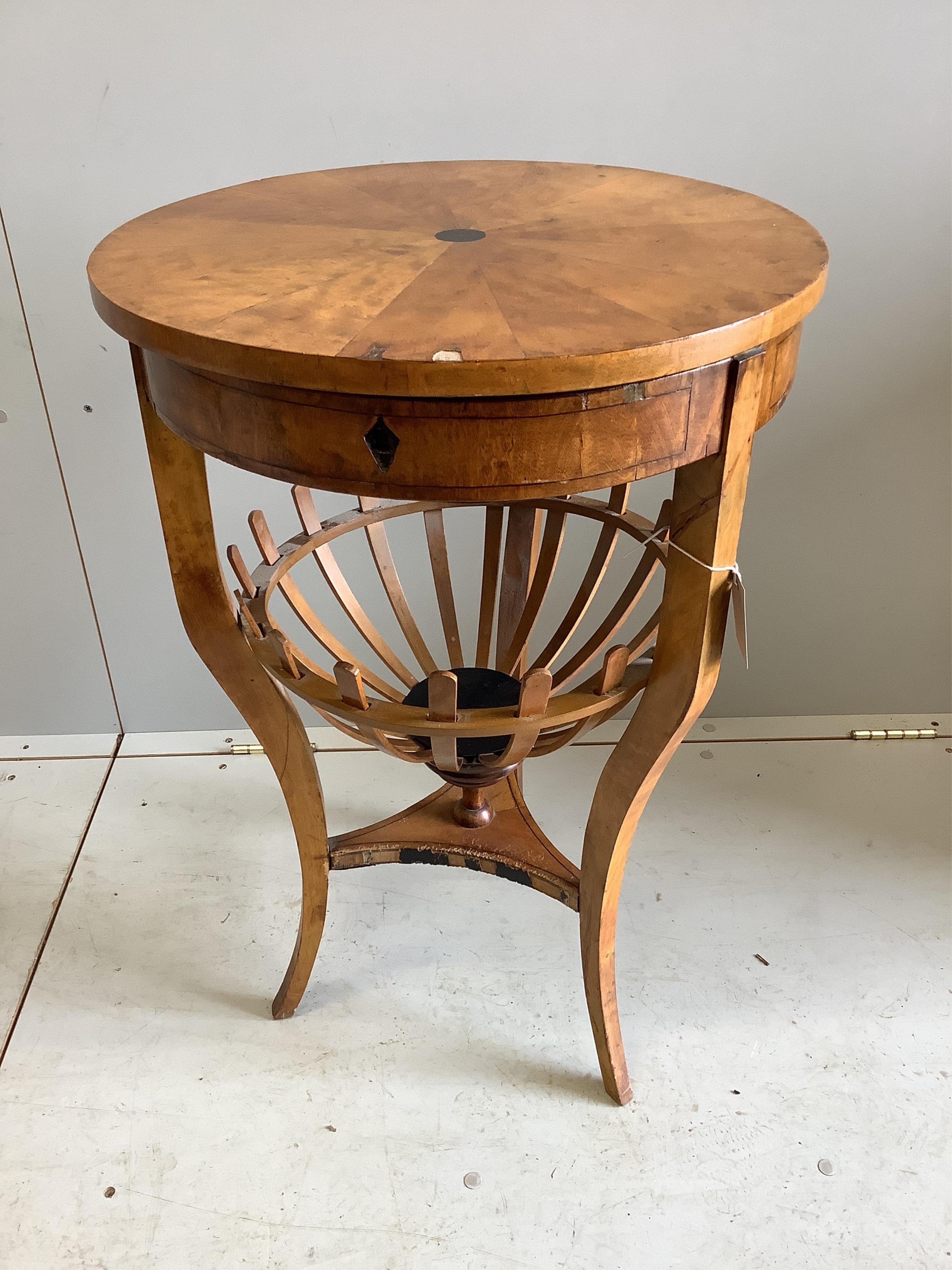 A 19th century Swedish Biedermeier circular birch work table, diameter 50cm, height 74cm. Condition - fair